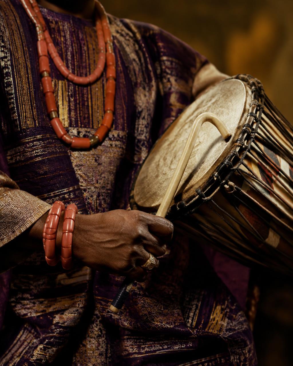 Yoruba talking drum and coral beads